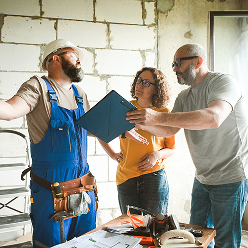 Family makes an agreement with a worker doing renovations in the apartment.