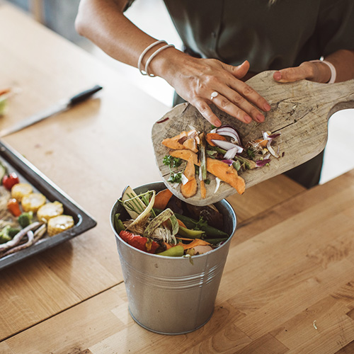 Making compost from vegetable leftovers.