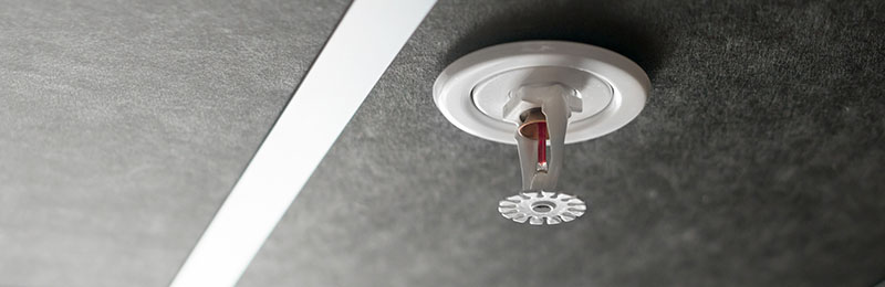Fire sprinkler on the ceiling.