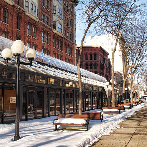 Snow on East Genesee Street in downtown Syracuse, New York between the SA&K Building and the State Tower Building.